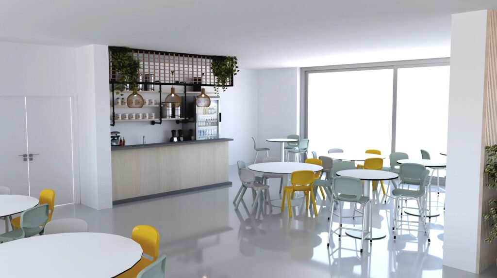 Refeitório com mesas redondas, cadeiras em tons pastel e balcão com dispensadores de bebidas.