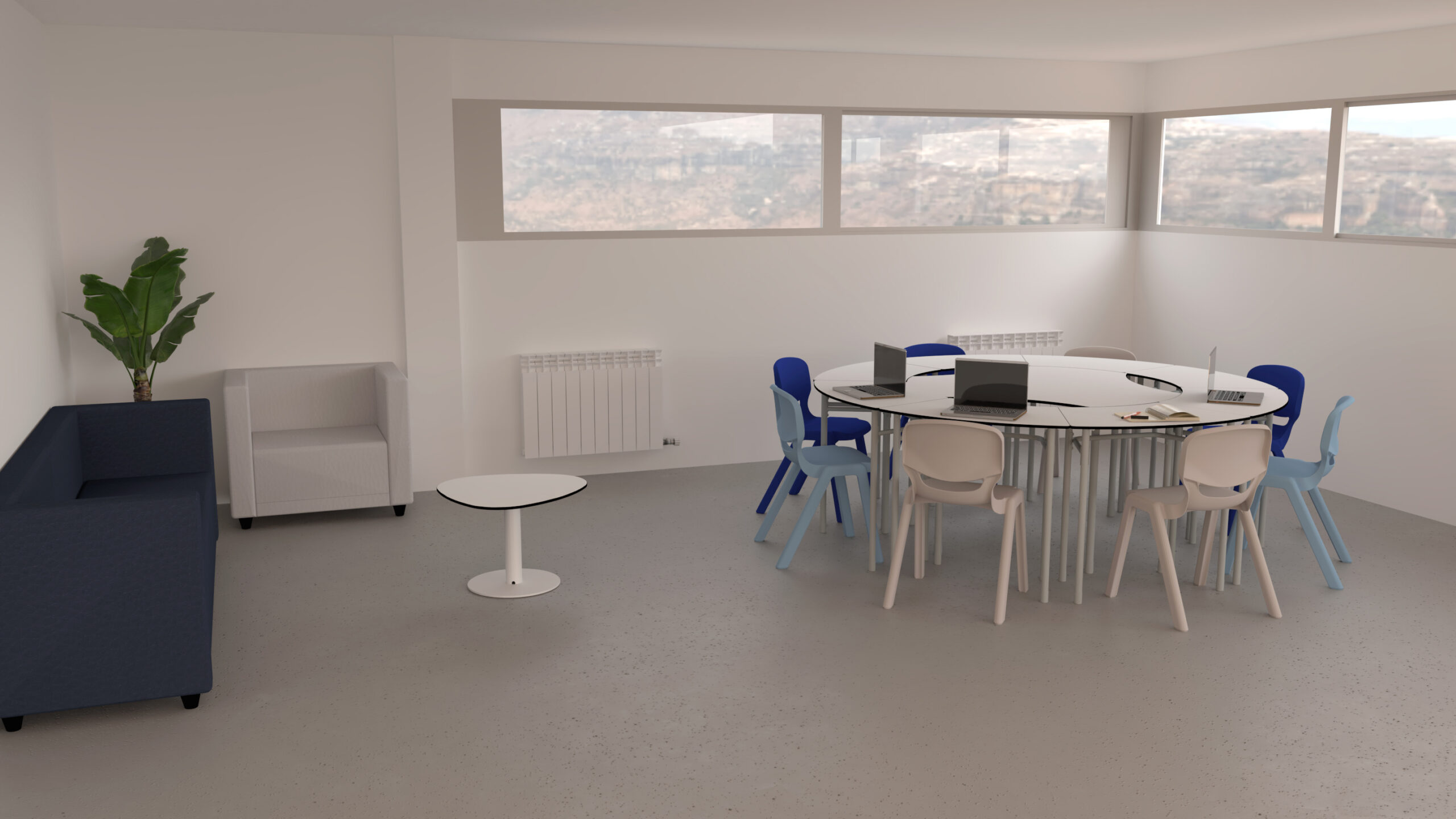 Sala de reuniões com mesa redonda, cadeiras azuis e brancas e zona de estar com sofá e cadeirão.