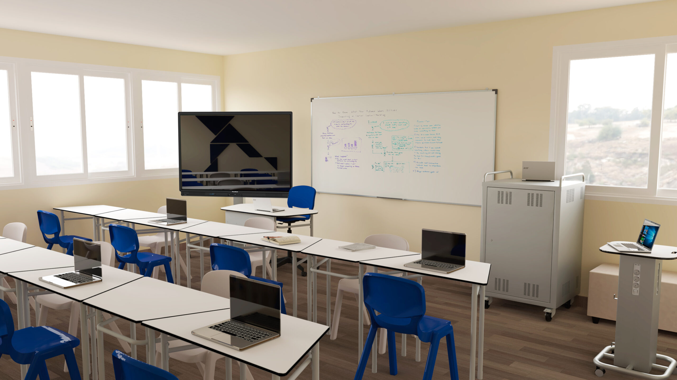 Sala com mesas brancas em filas, cadeiras azuis, computadores portáteis, quadro e ecrã.