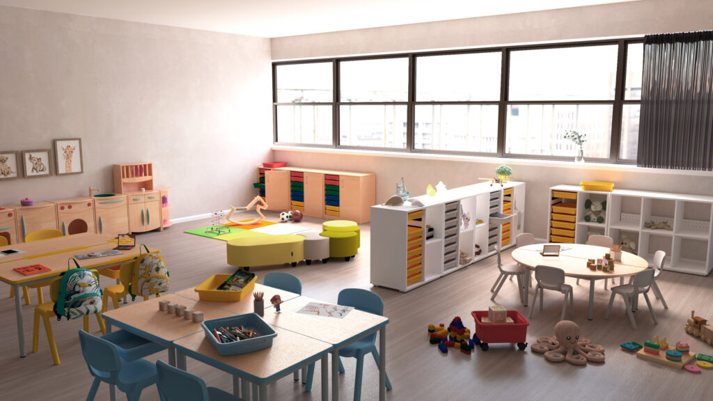 Sala infantil com mesas, cadeiras, brinquedos, estantes e materiais de actividades.