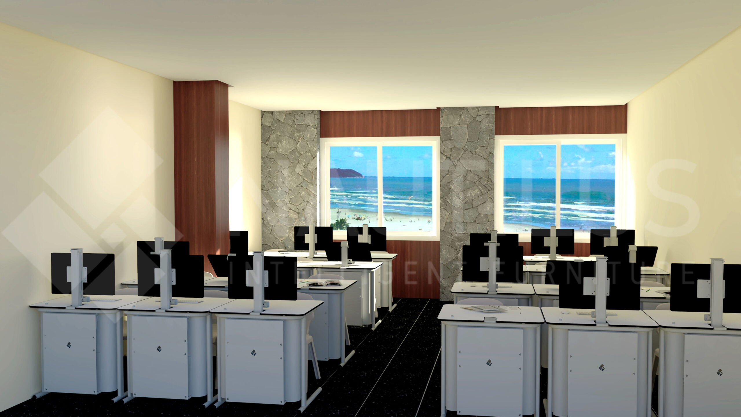 Sala com mesas brancas e computadores junto a janelas com vista para o mar.